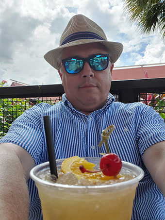 The Disney Cocktailor having a Mai Tai on the Tiki Terrace at Disney's Polynesian Resort